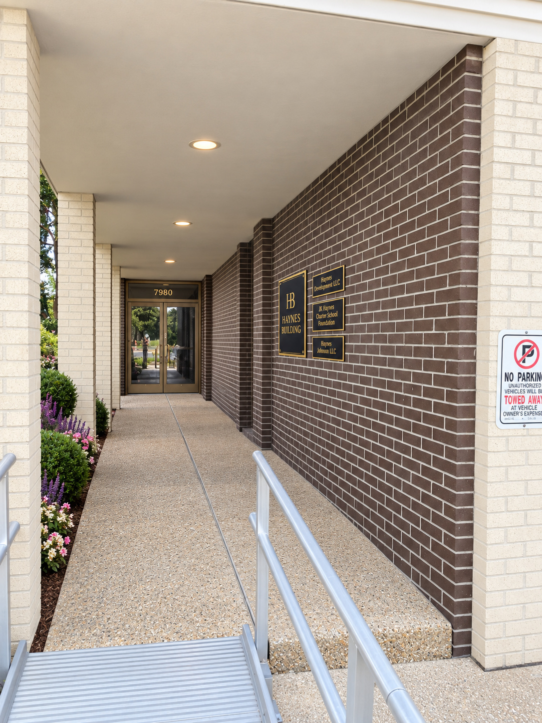 Covered walkway and ramp entrance at The Haynes Building in Baton Rouge.